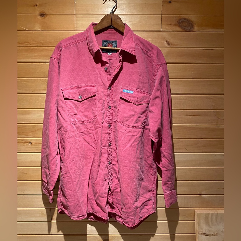 Washed-out Pink long sleeve button up shirt.